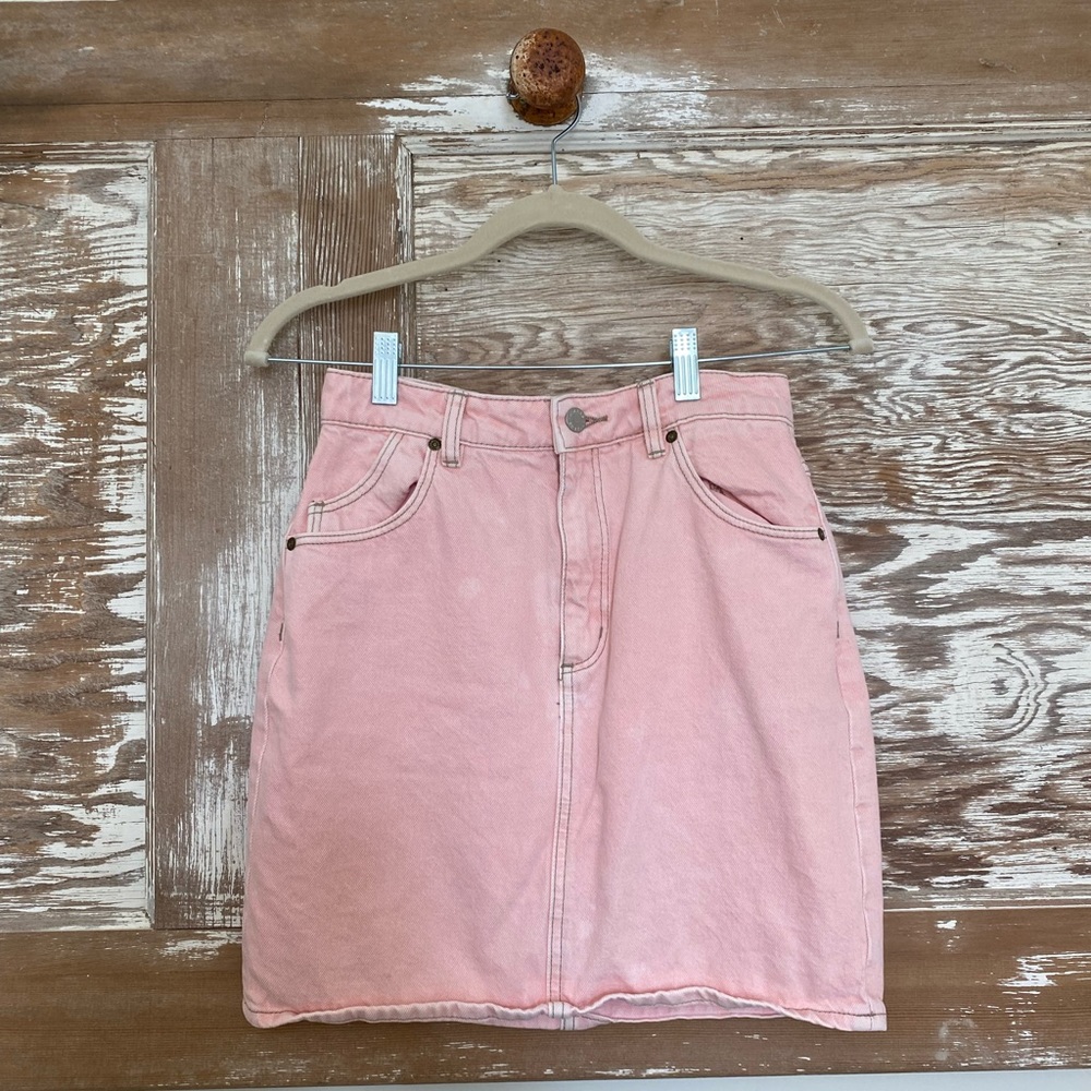 Pink denim skirt with detailed back pockets